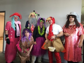 Employees at WorleyParsons became stylists for their United Way "Extreme Makeover - Employee Edition" fundraiser. Employees bought items from a trunk full of outfits, wigs, accessories and assorted costume pieces and placed their purchases in shopping bags with picture of their favourite colleague. Good-natured volunteers donned the duds, paraded through the office and posed for photos. The event raised $1,667 for the United Way. Participating employees included Joel Regenstreif, Chris Berry, Harvey Leckie, Leon Viljoen, Darren MacNaughton, and Gigi Walent-Burke in the front.
HANDOUT/ SARNIA OBSERVER/ POSTMEDIA NETWORK