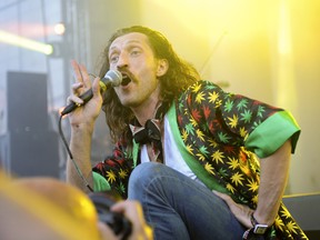Singer Eugene Hutz of Gogol Bordello ethno punk band performs at Lollapalooza in Chicago on Aug. 15, 2015.(WENN.COM)