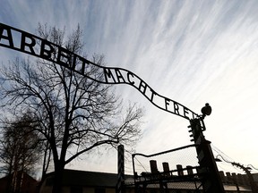 A file photo shows the main gate of the former Nazi concentration camp Auschwitz-Birkenau in Oswiecim Dec. 10, 2014. REUTERS/Kacper