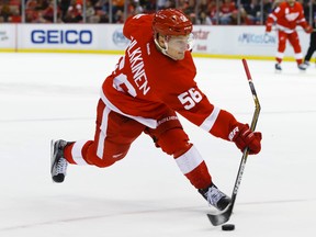 Detroit Red Wings left winger Teemu Pulkkinen breaks his stick as he takes a shot in the third period against the Dallas Stars at Joe Louis Arena in Detroit on Nov. 8, 2015. (Rick Osentoski/USA TODAY Sports)