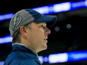 Tampa Bay Lightning head coach Jon Cooper on the ice with his team during training camp at the Amalie Arena in Tampa on Sept. 21, 2015. (Dirk Shadd/The Tampa Bay Times via AP)