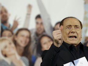 Forza Italia party (PDL) leader Silvio Berlusconi speaks during a Northern League rally in Bologna, central Italy, November 8, 2015. (REUTERS/Stefano Rellandini)