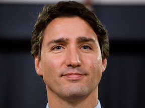 Prime Minister Justin Trudeau holds a news conference after chairing a meeting with his cabinet on Parliament Hill, in Ottawa, Thursday Nov.12, 2015. THE CANADIAN PRESS/Fred Chartrand