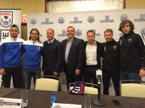 Members of Ottawa Fury FC and the New York Cosmos gathered for a press conference Friday at the Intercontinental Hotel in Time Square to kick off NASL Championship Weekend. From left, New York's Leo Fernandes, Carlos Mendes and coach Giovanni Savarese, Ottawa coach Marc Dos Santos, captain Richie Ryan and Tommy Heinemann. (Chris Hofley/Ottawa Sun)
