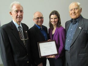 The Sarnia-based Bowman Centre was presented with a Resource Champion Award by the Sarnia Lambton Chamber of Commerce on Friday November 13, 2015 in Sarnia, Ont. From left, Don Wood with the Bowman Centre, Chamber chairperson Rob Taylor, and Katherine Albion and Walter Petryschuk, both also with the Bowman Centre.
Paul Morden/Sarnia Observer/Postmedia Network