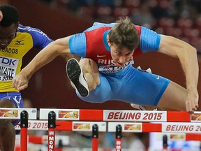 Russia's Sergey Shubenkov competes in a men's 110-metre hurdles semifinal at the World Athletics Championships in Beijing, China on Aug. 27, 2015. Shubenkov is among the leading Russian athletes who stand to miss out if the country is barred from international competition. (David J. Phillip/AP Photo/Files)