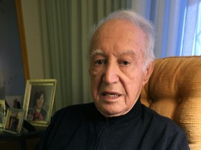 Max Labovitch, the last remaining member of the 1943-44 New York Rangers, is pictured in his West Kildonan home on Thu., Nov. 12, 2015. Labovitch can't believe the Rangers expect him to pay for a ticket to see his old team take on the Jets in Winnipeg next month. Kevin King/Winnipeg Sun/Postmedia Network