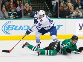 Toronto Maple Leafs centre Nazem Kadri (43) skates around Dallas Stars defender Mattias Janmark Tuesday, Nov. 10, 2015, in Dallas. (AP Photo/Tony Gutierrez)