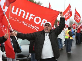Hundreds of taxi drivers protested at Coventry Connections headquarters on Coventry Road Friday Nov 13, 2015. Coventry Connections alleges airport cabbies caused $75,000 damage to their call centre. 
Tony Caldwell/Ottawa Sun