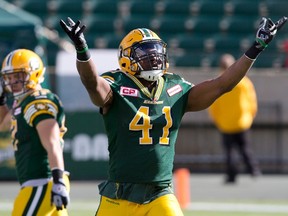 Fan favourite Odell Willis celebrates a tackle against the B.C. Lions earlier this year (Jason Franson, The Canadian Press).