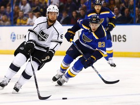 Los Angeles Kings' Jake Muzzin pulls away (Billy Hurst/AP).