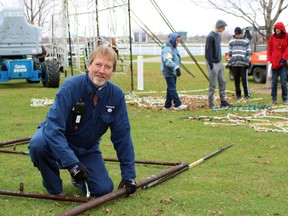 Rob Dunsworth from Sarnia helped set up the Celebration of Lights Saturday morning at Centennial Park. Dunsworth was one of around 40 volunteers who helped put the annual display together. Terry Bridge/Sarnia Observer/Postmedia Network