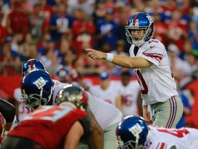 New York Giants quarterback Eli Manning points against the Tampa Bay Buccaneers during the first half at Raymond James Stadium in Tampa on Nov. 8, 2015. (Kim KlementéUSA TODAY Sports)