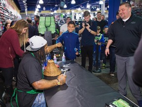 Seattle Seahawks Running Back Marshawn Lynch attends an in-store appearance for the launch of BEASTMODE x PSD at Champs at Bellevue Square in Bellevue on Nov. 13, 2015. (Mat Hayward/Getty Images for PSD Underwear/AFP)