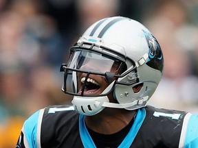 Cam Newton of the Carolina Panthers reacts after a touchdown against the Green Bay Packers during a game at Bank of America Stadium in Charlotte on Nov. 8, 2015. (Streeter Lecka/Getty Images/AFP)