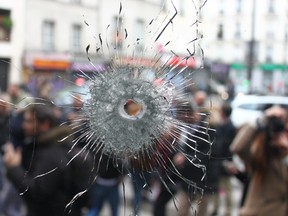 A bullet hole in a sushi restaurant at rue Charonne where 19 people died in one of several co-ordinated terrorist attacks in Paris on Nov. 15, 2015. (Vivian Song/Toronto Sun)