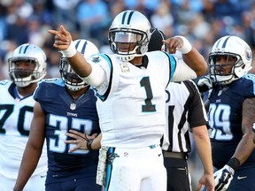 Cam Newton of the Carolina Panthers celebrates during the second half against the Tennessee Titans at LP Field in Nashville on Nov. 15, 2015. (Andy Lyons/Getty Images/AFP)