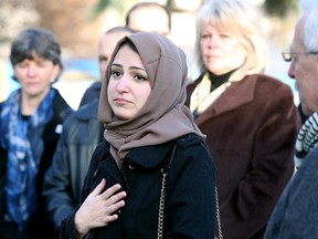 Gino Donato/Sudbury Star
Laurentian University international student Maryam Abdulahad  shares some thoughts at a vigil  on Sunday. The event was held at Memorial Park to show support for France and the victims of Friday's terrorist attacks.