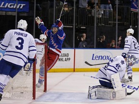 New York Rangers centre Derek Stepan celebrates scoring a goal past Toronto Maple Leafs goalie Jonathan Bernier at Madison Square Garden in New York City on Nov. 15, 2015. (Adam Hunger/USA TODAY Sports)