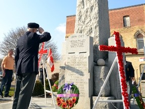 After laying a wreath at the Mitchell cenotaph, WWII veteran John Ward salutes his fallen comrades during a short ceremony after the public service at the Mitchell Arena & Community Centre during Remembrance Day last Wednesday, Nov. 11. Beautiful, warm skies was prevalent for the ceremony. GALEN SIMMONS/MITCHELL ADVOCATE