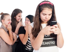 Cyberbullying is a major threat yet to teens and kids. (Fotolia)