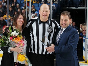 In the middle is Scott Driscoll from Seaforth. The NHL acknowledged him for his 1500th game on November 14. (Courtesy of the Buffalo Sabres Twitter)