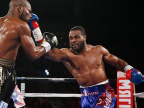 Jean Pascal (right) hits Yunieski Gonzalez during their light heavyweight bout Saturday, July 25, 2015, in Las Vegas. (THE CANADIAN PRESS/AP/John Locher)