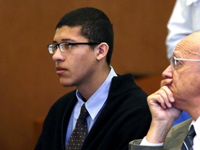 Philip Chism, left, appears in Salem Superior Court where a judge declared the Massachusetts teenager charged with raping and killing his math teacher competent to stand trial, in Salem, Mass. Chism's lawyers plan to make opening statements Monday, Nov. 16, 2015. (Ken Yuszkus/The Salem News via AP, Pool, File)