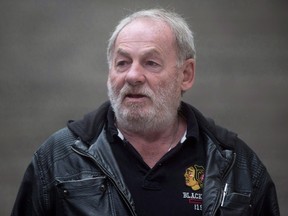 Ivan Henry, who was wrongfully convicted of sexual assault in 1983, leaves B.C. Supreme Court during a lunch break in Vancouver, B.C., on Monday August 31, 2015. (THE CANADIAN PRESS/Darryl Dyck)