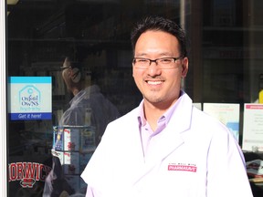 John Chang, chief pharmacist at Pharmasave in Norwich, is an advocate of shopping local. Pharmasave is participating in the Buy Close By campaign, a pilot project in Norwich Township. (MEGAN STACEY, Sentinel-Review)