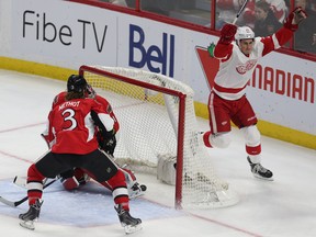 The Ottawa Senators took on the Detroit Red Wings at Canadian Tire Centre in Ottawa Ontario Monday Nov 16, 2015. Senators goalie Craig Anderson gets scored on by Wings forward Dylan Larkin during first period action Monday. Tony Caldwell/Ottawa Sun/Postmedia Network