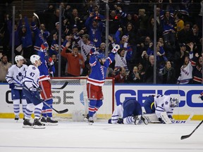 New York Rangers centre Derick Brassard reacts after Mats Zuccarello (not pictured) scored the game-winning goal on Toronto Maple Leafs goalie Jonathan Bernier at Madison Square Garden in New York City on Nov. 15, 2015. (Adam Hunger/USA TODAY Sports)