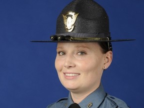 This July 2015 photo provided on Nov. 16, 2015 by the Colorado State Patrol shows thirty-three-year-old Colorado State Patrol trooper Jaimie Jursevics, who authorities say was killed after being struck by a car while investigating an accident on an interstate south of Denver. Jursevics was hit on southbound Interstate 25 near Castle Rock, Colo., around 9 p.m. Sunday, Nov. 15, 2015. (Colorado State Patrol via AP)