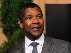 In this Feb. 4, 2013 file photo, actor Denzel Washington, nominated for best actor in a leading role for "Flight," arrives at the 85th Academy Awards Nominees Luncheon in Beverly Hills, Calif. The Hollywood Foreign Press Association announced on Monday, Nov. 16, 2015, that the two-time Golden Globe Award-winner Washington will be honored with the 2016 Cecil B. DeMille Award at the 73rd Annual Golden Globe Awards on Sunday, Jan. 10, 2016, hosted by Ricky Gervais. (Photo by Chris Pizzello/Invision/AP, File)