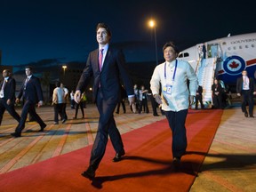 Prime Minister Justin Trudeau arrives in Manila, Philippines, on Nov. 17, 2015, to attend the APEC Summit. (THE CANADIAN PRESS/Sean Kilpatrick)