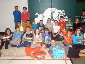 Meghan Lung's Grade 6 class at H.W. Burgess made boxes to send to kids around the world as part of the Operation Christmas Child campaign. The Operation Christmas Child boxes includes information about the students. The boxes contained a number of items—such as small toys, school supplies, soap, and a picture of the class, with students aiming to make a difference in the lives of students in faraway countries. This is the second year that Lung's class has made the boxes and shipped them out to countries in Asia, Central America and Africa. In total the class contributed and made nine boxes this year.