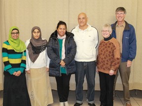 Members of the Sarnia Muslim Association and the Unitarian Fellowship of Sarnia and Port Huron have been working on plans to bring in a family of five refugees from war-torn Syria. From left to right: Aruba Mahmud, Fatima Haffejee, Sonia Marsy, Aly Marsy, Ann Steadman and Dwayne O'Neill. 
CARL HNATYSHYN/SARNIA THIS WEEK