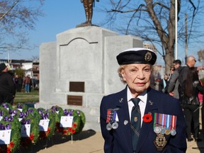 Second World War veteran Marion Bradley stands in front of the Sarnia cenotaph following the Remembrance Day service that took place on Nov. 11. Bradley – a recipient of the Queen's Gold and Diamond Jubilee medals – said that she's been encouraged by the increasing interest in Remembrance Day over the past few years. 
CARL HNATYSHYN/SARNIA THIS WEEK