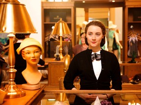 This photo provided by Fox Searchlight shows, Saoirse Ronan as Eilis in a scene from the film, "Brooklyn."  The movie opens in U.S. theaters on Nov. 4, 2015. (Kerry Brown/Fox Searchlight)
