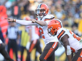 Cleveland Browns quarterback Johnny Manziel (2) gestures at the line of scrimmage during NFL play against the Pittsburgh Steelers Sunday at Heinz Field. (Charles LeClaire/USA TODAY Sports)