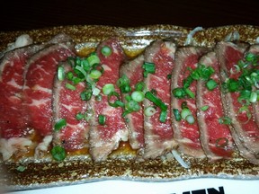 Kazoku 's tender and delicate beef tataki. Photo by Graham Hicks
