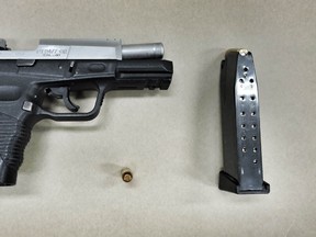 A prohibited Taurus .40-caliber handgun seized from a Fort McMurray home. (Supplied)