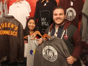 Queen's University students Styna Tao, left, and Harrison McNaughtan are co-head managers of Oil Thigh Designs, the student-run, not-for-profit business that sells university-themed clothing to Queen's students.
Michael Lea/The Whig-Standard