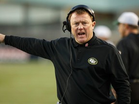 Edmonton's head coach Chris Jones makes a call during the first half of CFL action between the Edmonton Eskimos and the B.C. Lions at Commonwealth Stadium in Edmonton on Oct. 17, 2015. (Ian Kucerak/Edmonton Sun/Postmedia Network)