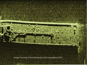 This undated image created with a side scan sonar shows the barge, Argo, on the bed of Lake Erie near the Canada-U.S. border. A salvage operation is needed because fuel tanks on the ship are leaking. Tom Kowalczyk via The Associated Press