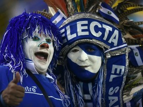 Supporters of El Salvador wait for the start of the Russia 2018 FIFA World Cup CONCACAF qualifiers football match against Canada, in San Salvador on Nov. 17, 2015. (AFP PHOTO/MARVIN RECINOS)