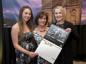 Farm and Food Care Ontario photo
Kaitlyn, left, Sandy and Kelsey Vader hold the 2016 Farm and Food Care Ontario calendar at its Oct. 29 launch in Kitchener. They appear on its September pages. It promotes Ontario's farmers and profiles their diverse approaches to the work.