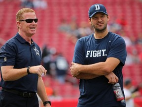 Dallas Cowboys head coach Jason Garrett (left) and Tony Romo look on during a game against the Tampa Bay Buccaneers at Raymond James Stadium on November 15, 2015 in Tampa. (Mike Ehrmann/Getty Images/AFP)