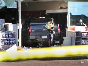A truck drove into the Petro Can at 118 ave and 97 st in Edmonton, Alta., on  Nov 18, 2015. No word on injuries at this time. Perry Mah/Edmonton Sun