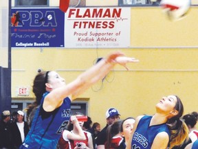 Hawk Karmen Mix pushes the volleyball back over the net Nov. 12 during the 2A South Zone Volleyball Championships at Lethbridge College. Stephen Tipper Vulcan Advocate